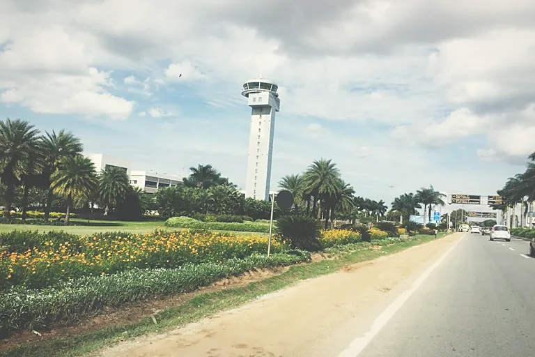 Control tower beyond the landside planting, Bangalore International Airport